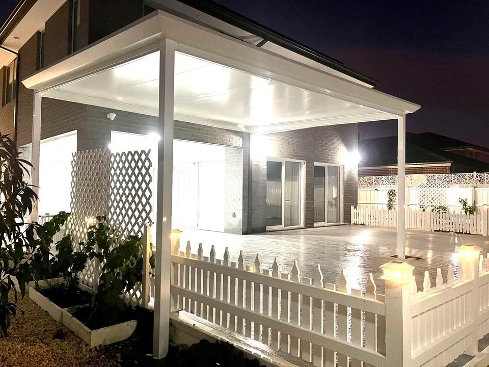 Modern pergola with LED lighting at night